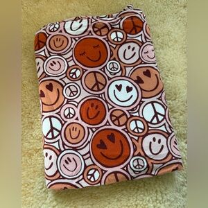 Little Sleepies Groovy swaddle